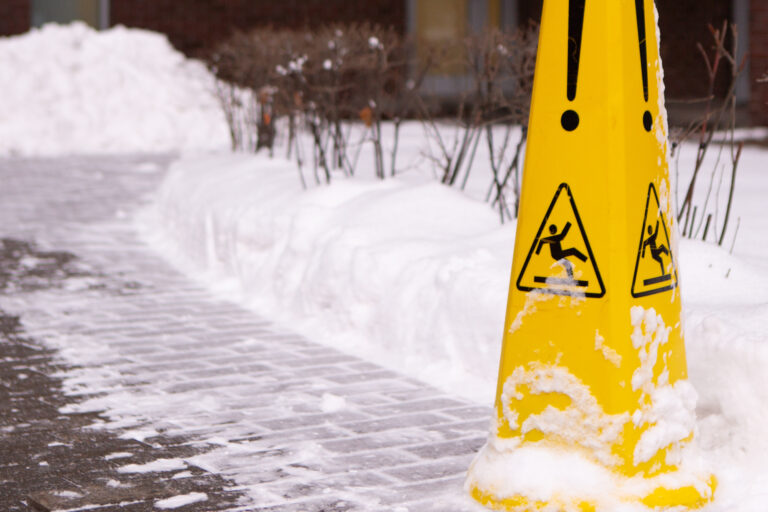 slippery surface, icy sidewalk in Michigan used to represent changes in open and obvious premise liability law